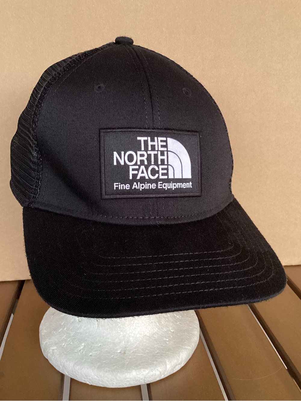 The North Face SnapBack Trucker Hat logo